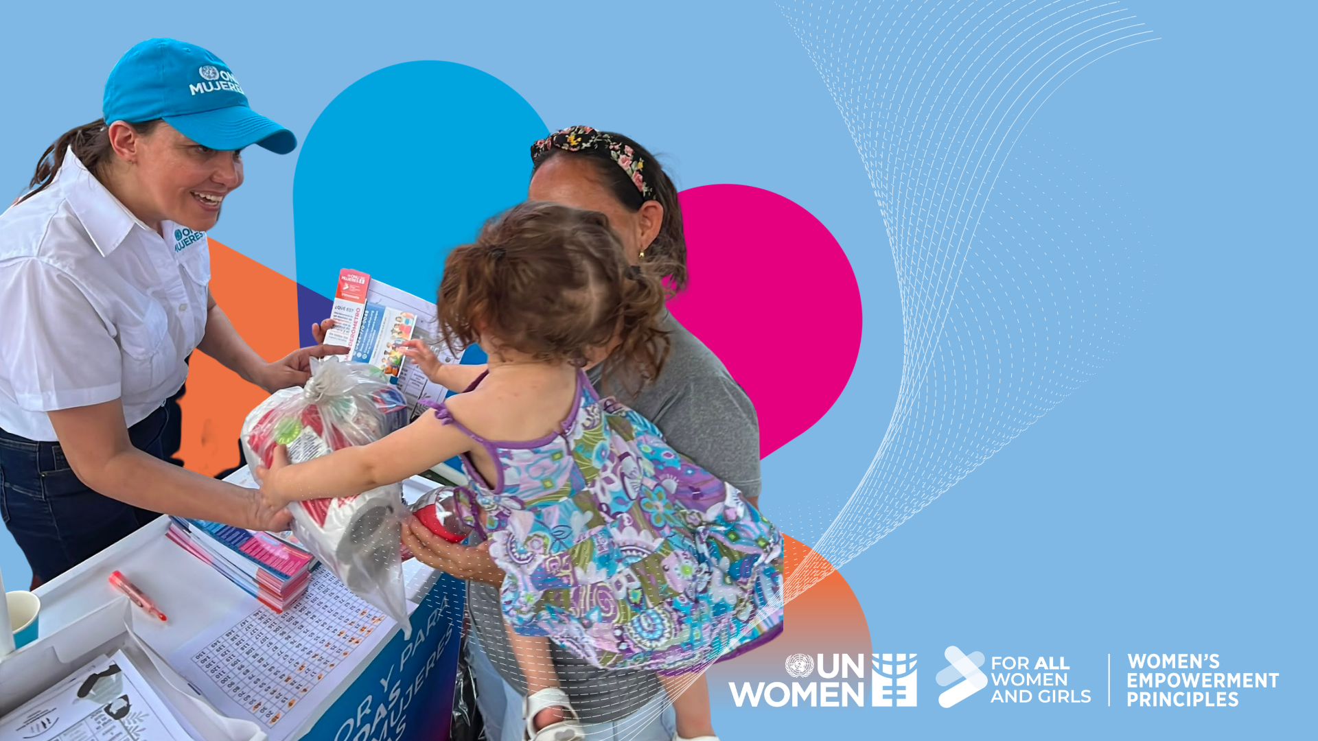 woman in un women cap hands toilet roll to woman holding child